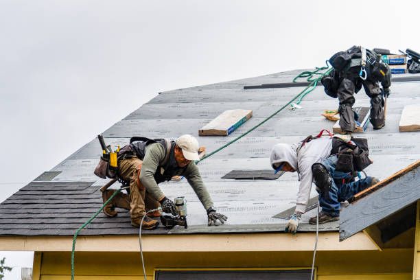 Professional Roofing technician working in Vergennes, VT